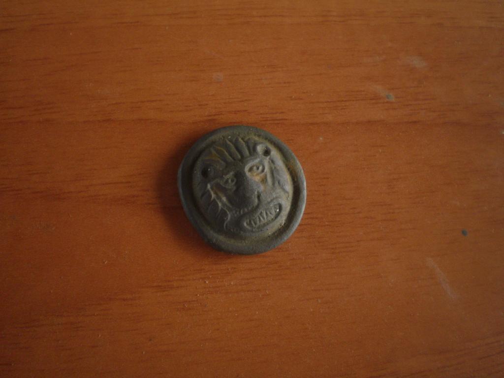лев