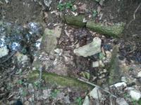 Засыпанный колодец партизан