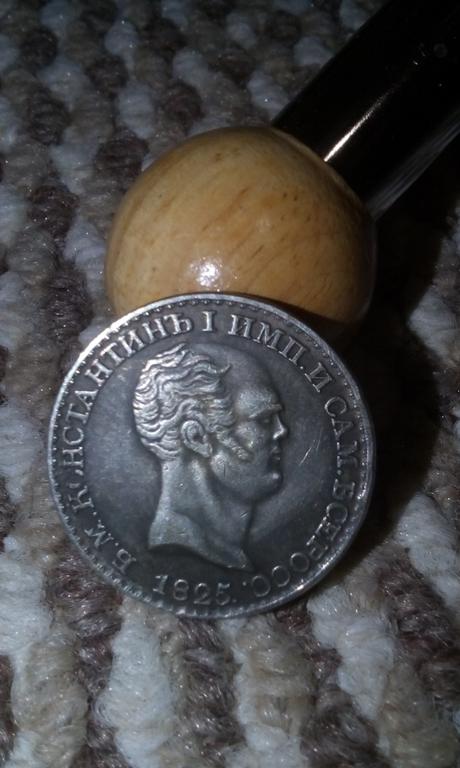 Оцените, что за монета