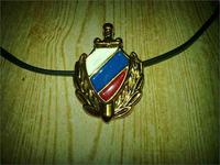 значек 