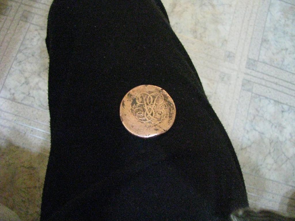 монета