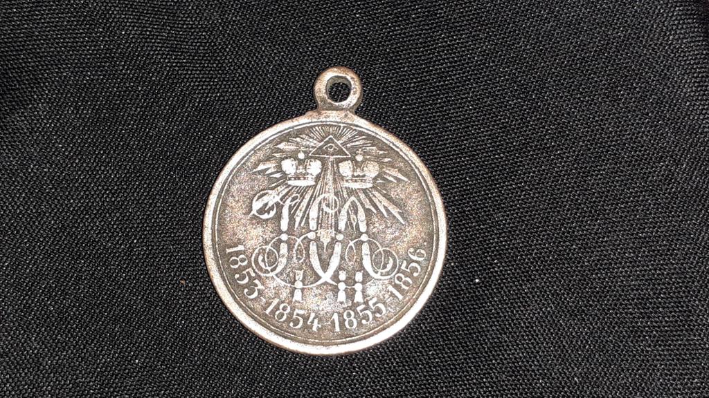 Медаль патина