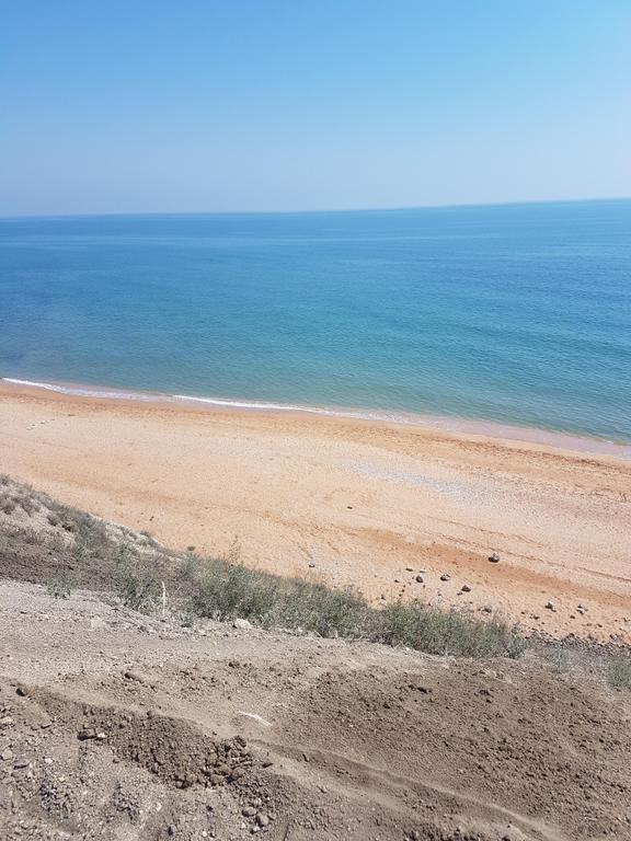 Вид с раскопа на море