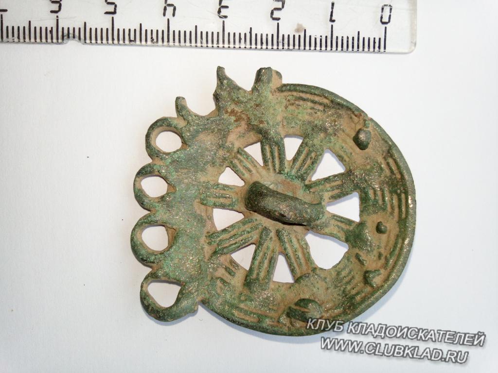 солярный символ - оборотная сторона