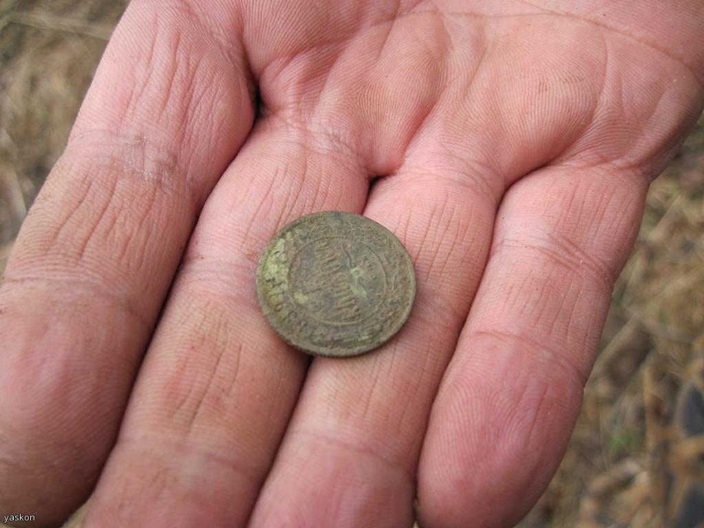 первая монета